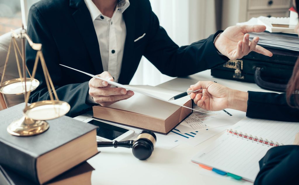 a woman at a lawyer consultation