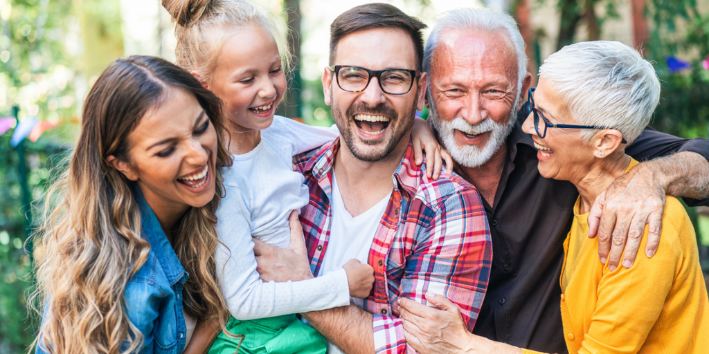 happy members of a family embracing