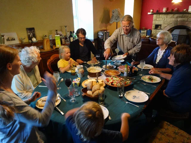 family members sitting at a holiday dinner