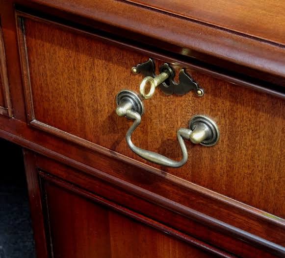a drawer with a key inserted